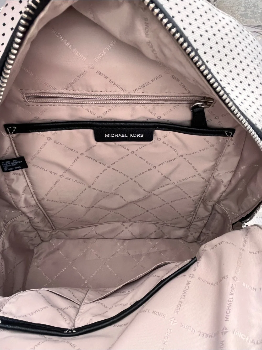 Michael Kors White and Black Perforated Leather Backpack